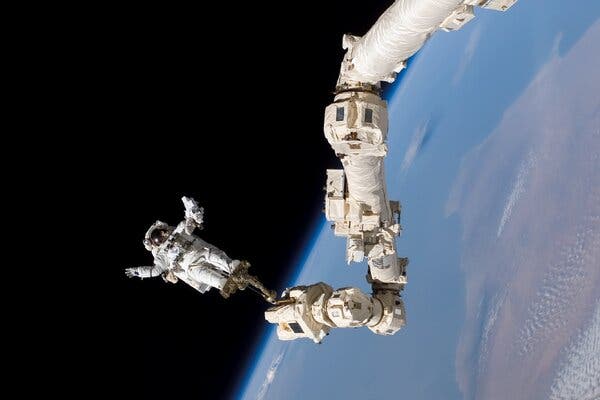 Stephen K. Robinson was anchored to the space station’s Canadarm2 in 2005.