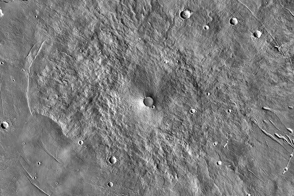 An infrared image mosaic of the Elysium Mons volcano taken by the Mars Odyssey spacecraft in 2001.